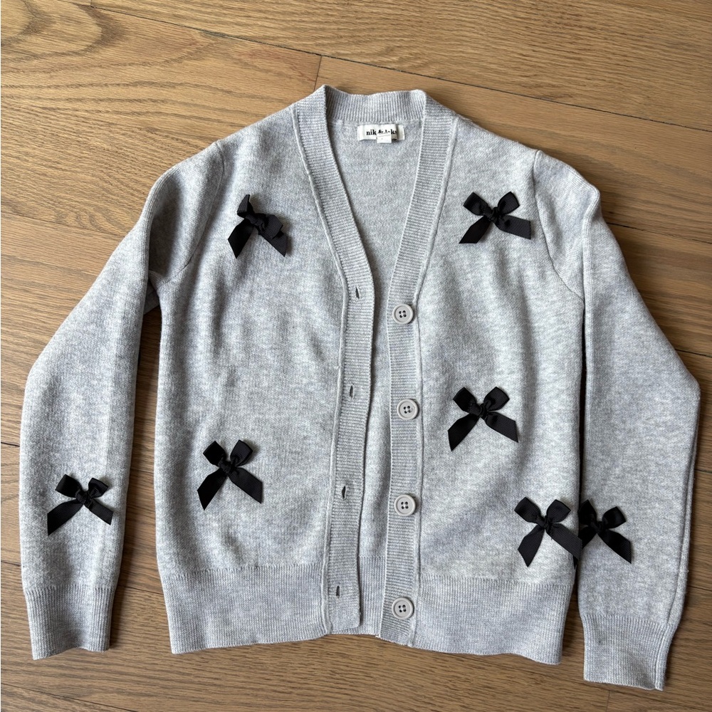Girls knit cardigan with bows-Size medium (10/12). Worn once!